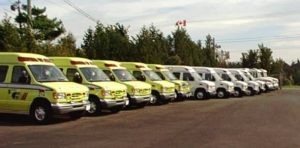 Row of Demers ambulances parked side by side outdoors