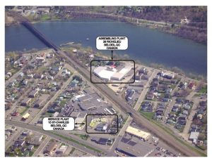 Aerial view of an industrial area with labeled buildings near a river